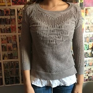 greyish sweater, the blouse is separate!